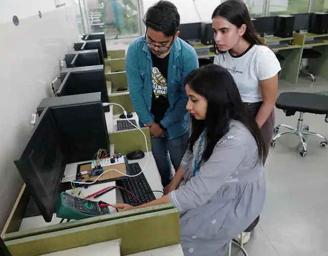 students testing circuits